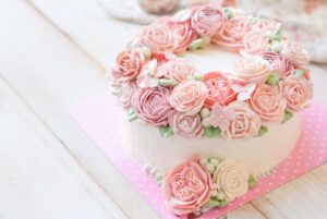 Elegant bridal shower cake with flowers and pastel decorations in Irvine